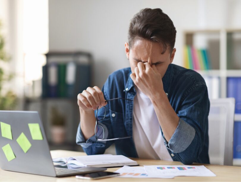 stressed man at his desk