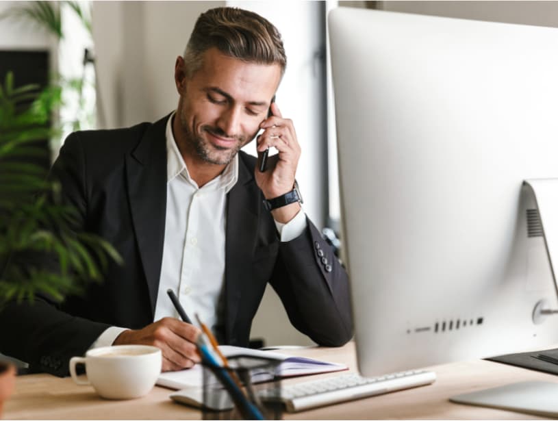 Sales professional calling a new inbound lead to improve speed to lead and book a meeting.